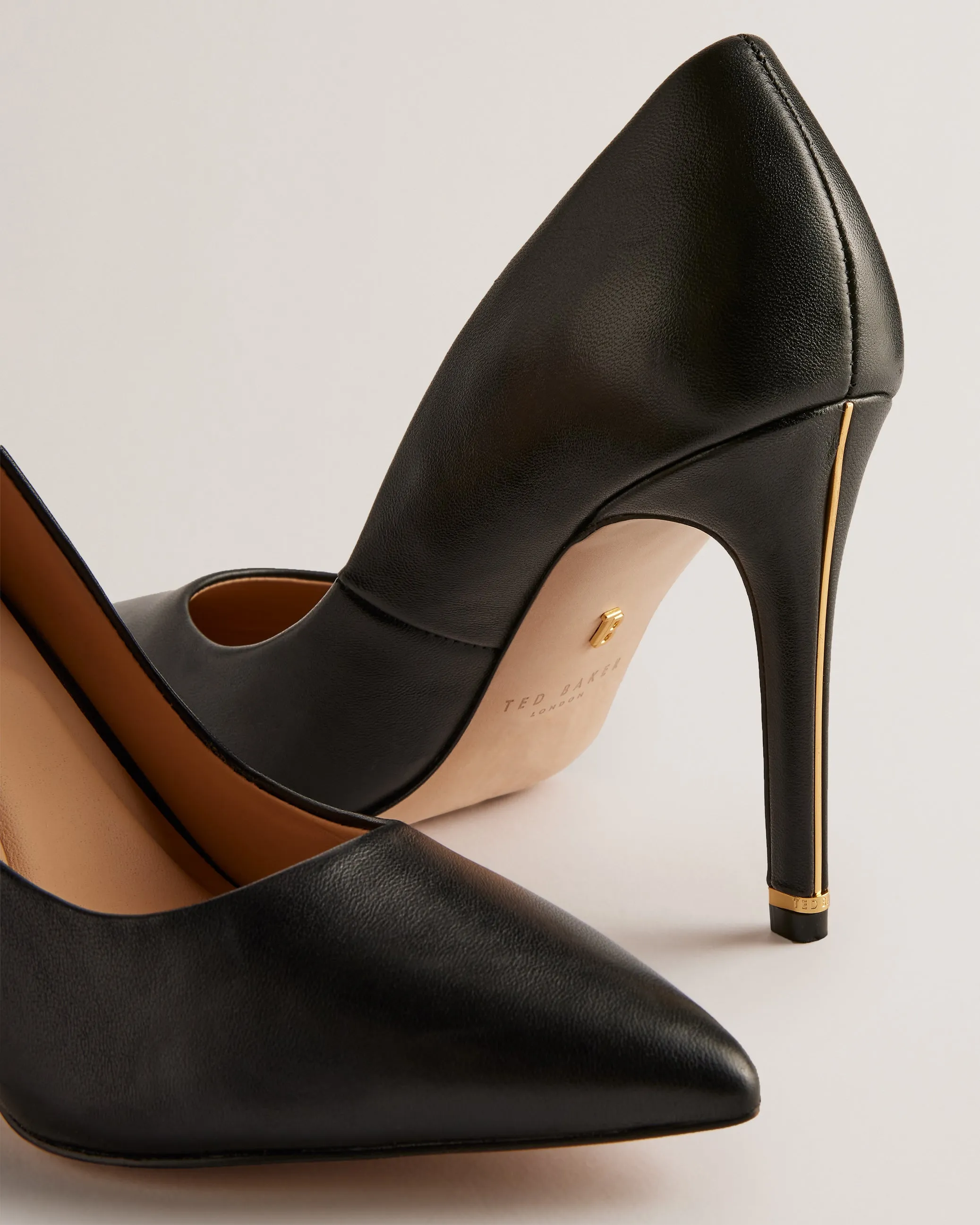 Caaraa High-Heeled Pump With River Of Gold Heel Black